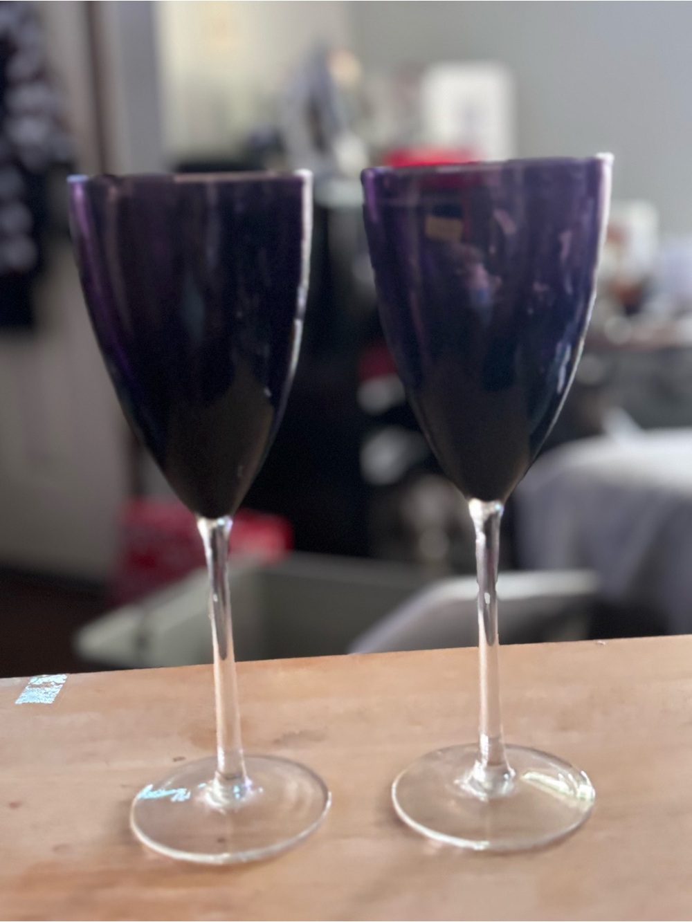 vintage hand-blown wine glasses feature a deep amethyst purple bowl